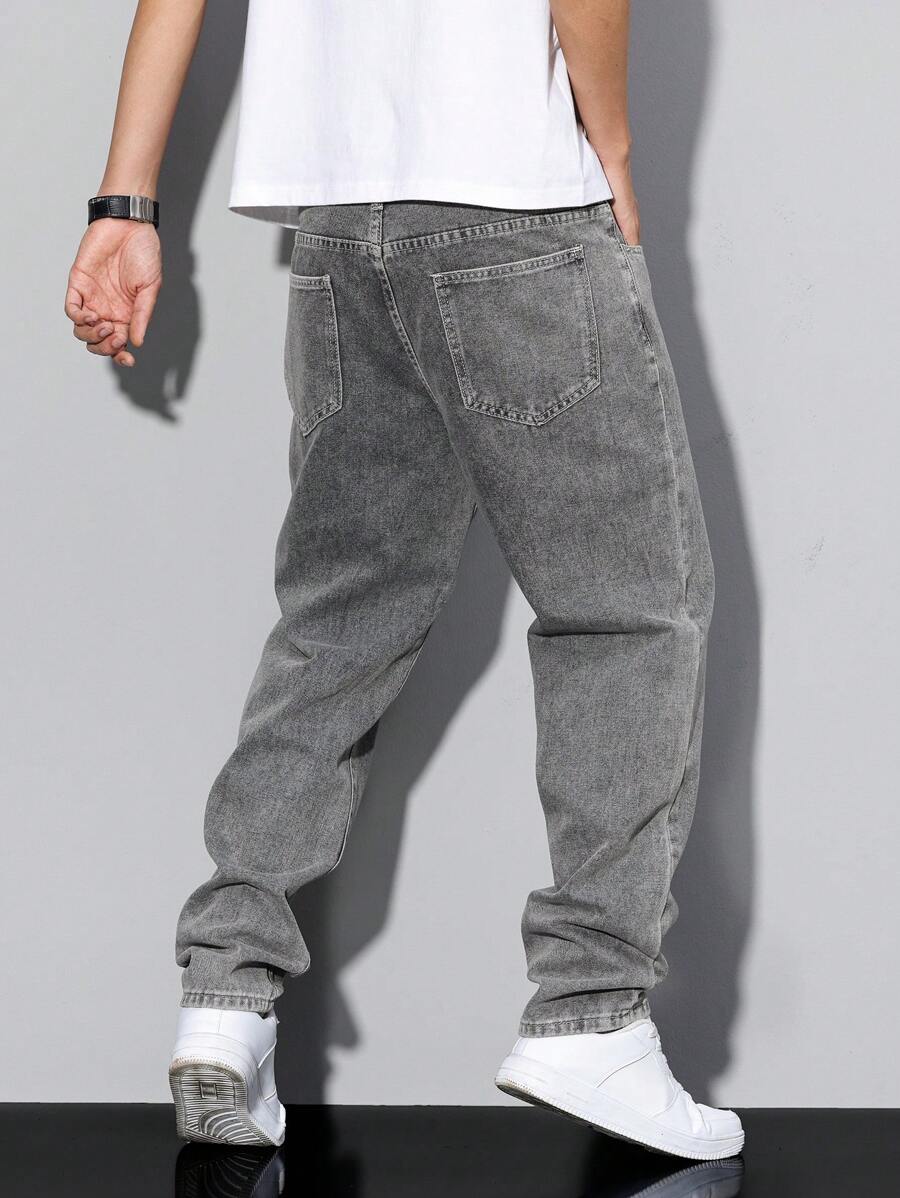 Distressed Tapered Denim Jeans