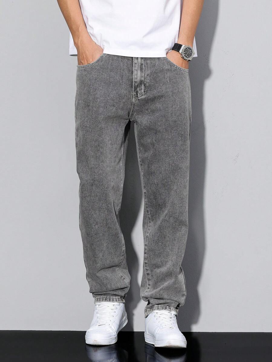 Distressed Tapered Denim Jeans