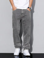 Distressed Tapered Denim Jeans