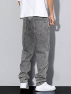 Distressed Tapered Denim Jeans
