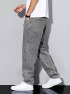 Distressed Tapered Denim Jeans