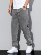 Distressed Tapered Denim Jeans