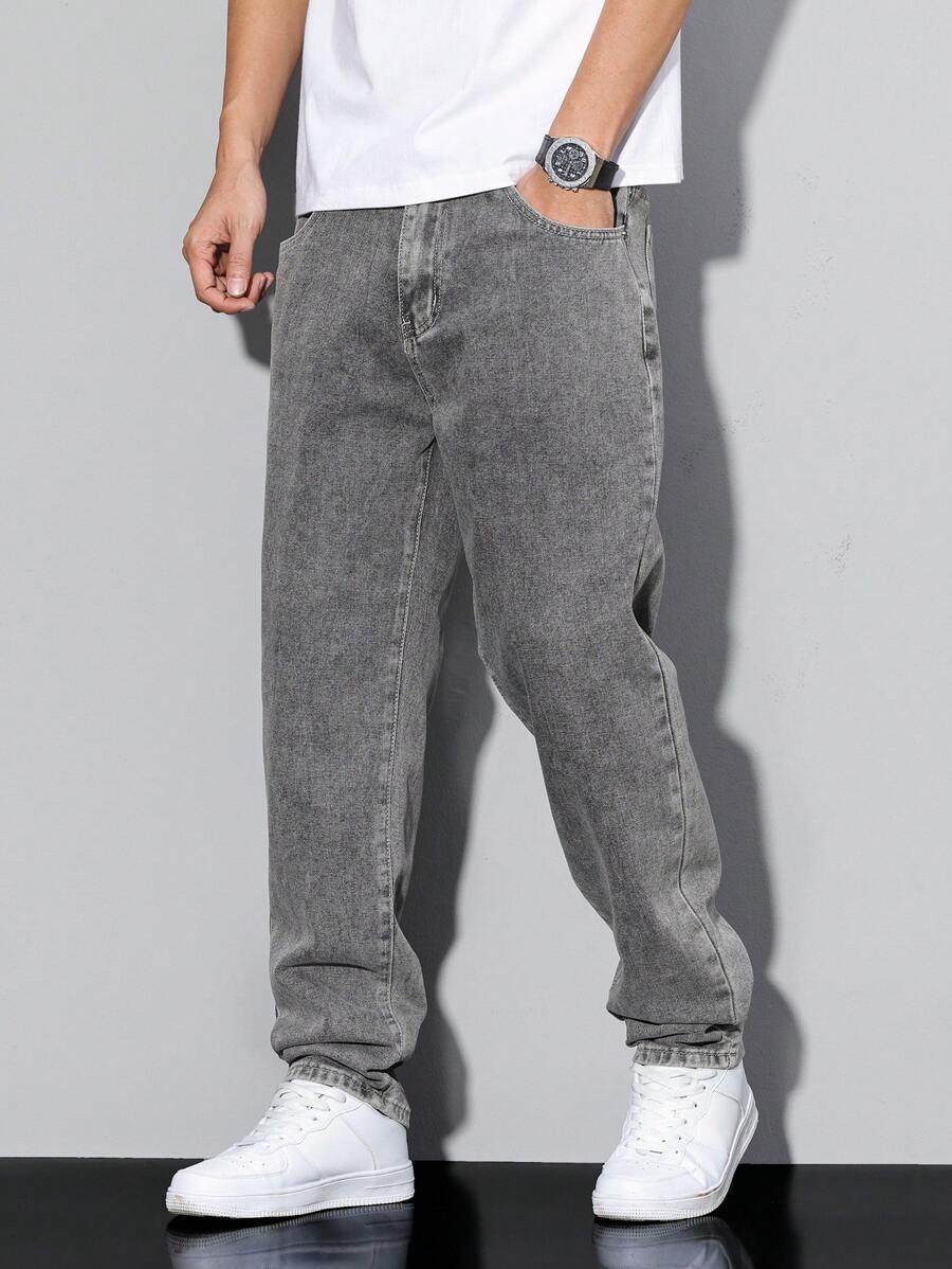 Distressed Tapered Denim Jeans