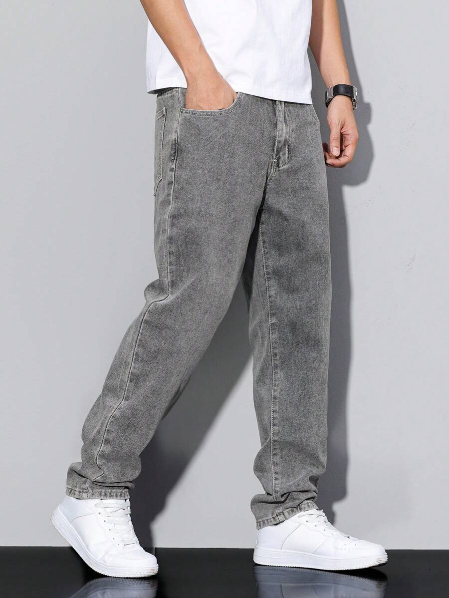 Distressed Tapered Denim Jeans