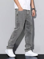 Distressed Tapered Denim Jeans